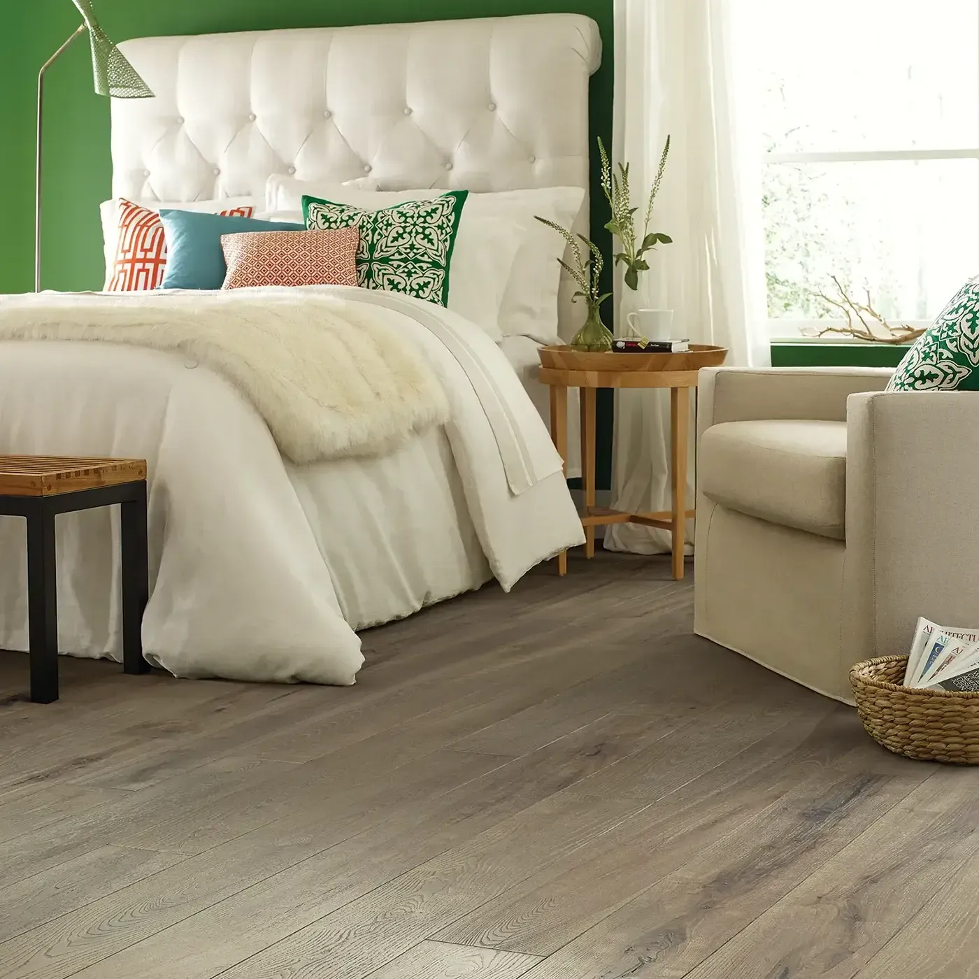 2W745_07028_ROOM Gray-toned hardwood in a bedroom with a white tufted headboard | The Carpet Factory Super Store