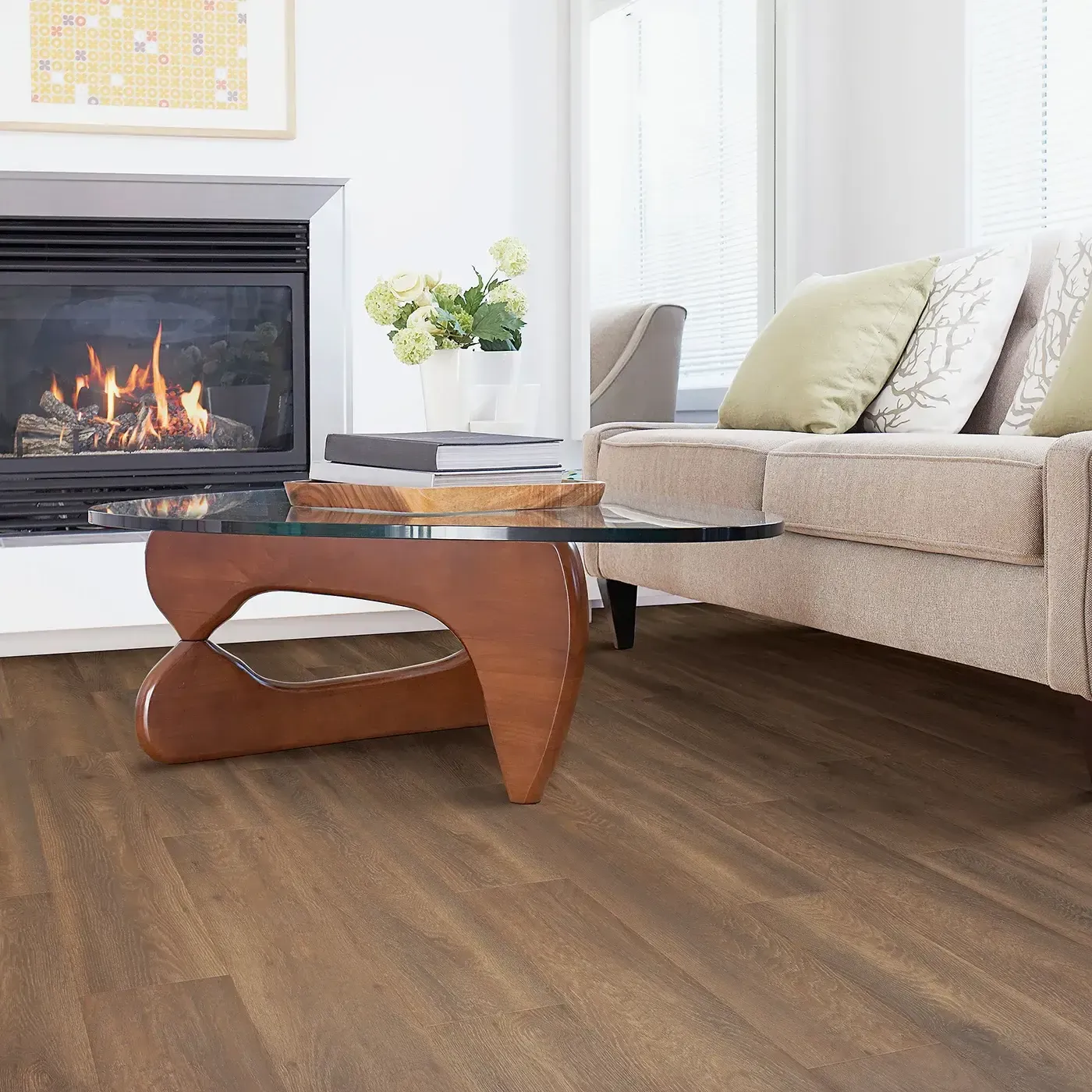 33609_04_room Laminate in a medium brown wood tone in a living room with a fireplace | The Carpet Factory Super Store
