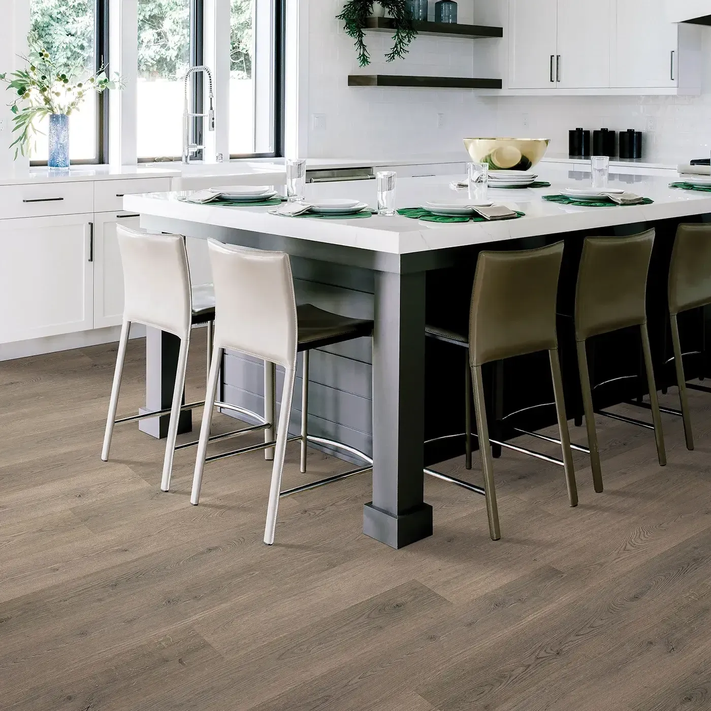 33619_958_room Mohawk Laminate in a gray-brown wood tone in a modern kitchen | The Carpet Factory Super Store