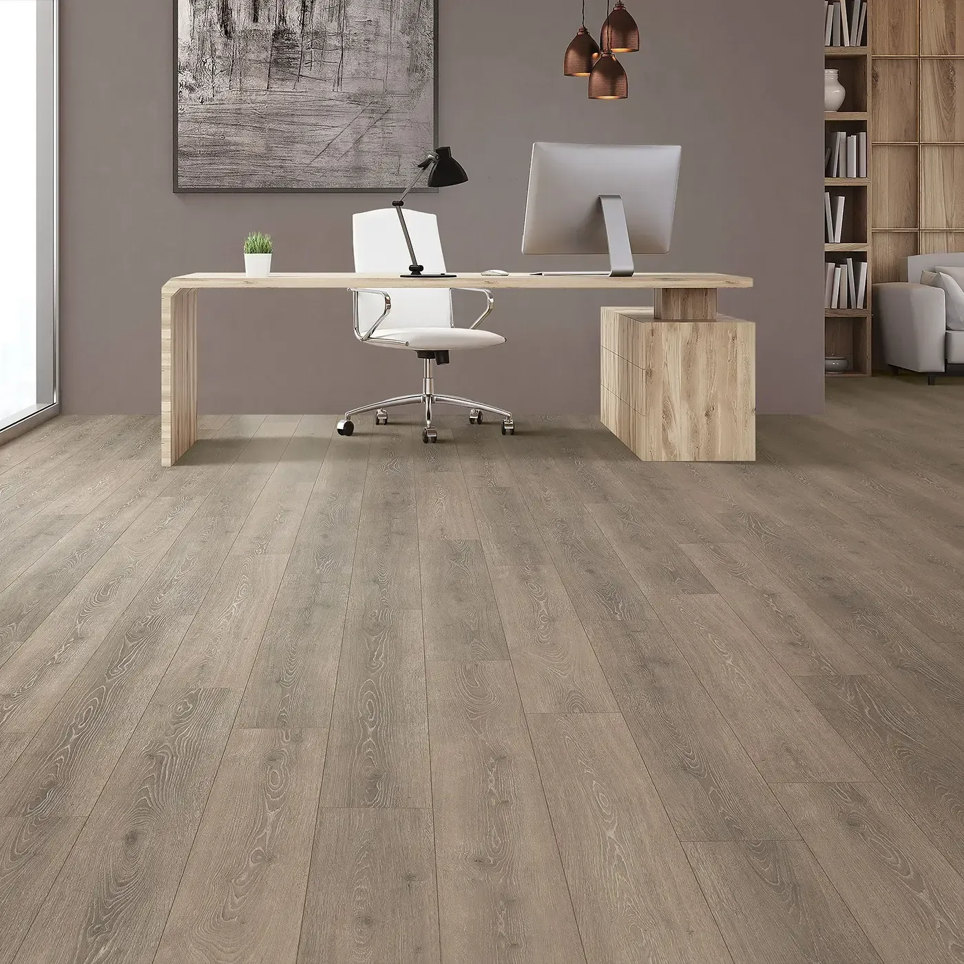 33634_10W_room Mohawk Laminate in a gray-brown wood tone in a home office | The Carpet Factory Super Store
