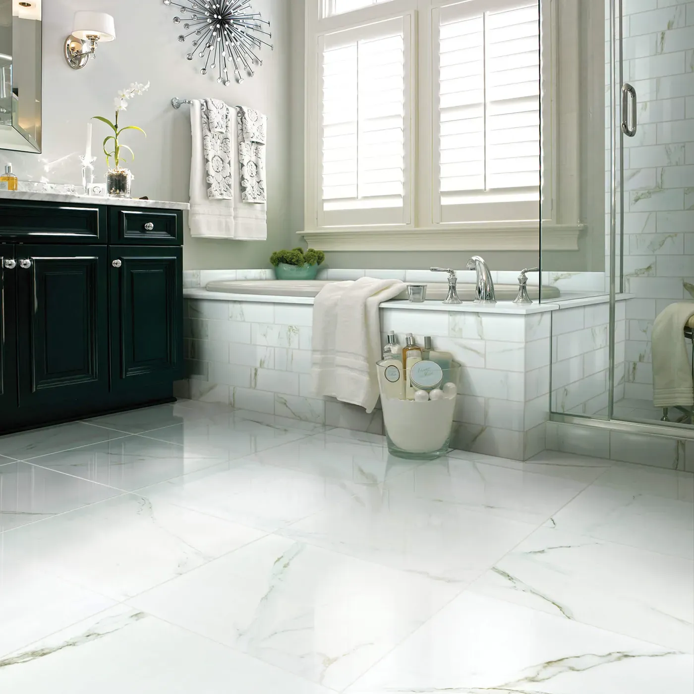 CASINO-POLISHED-CS37V-CASINO4X12-CS35V-CALACATTA-ORO-00121-V Shaw Floors Calacatta Oro polished white marble-look tile in a luxurious bathroom | The Carpet Factory Super Store
