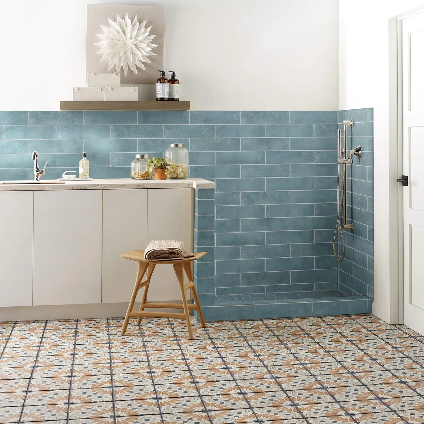 Noble-306TS-00450-Mint-3x12-RM-V Mint blue subway tile on the wall and multi-colored patterned tile on the floor | The Carpet Factory Super Store