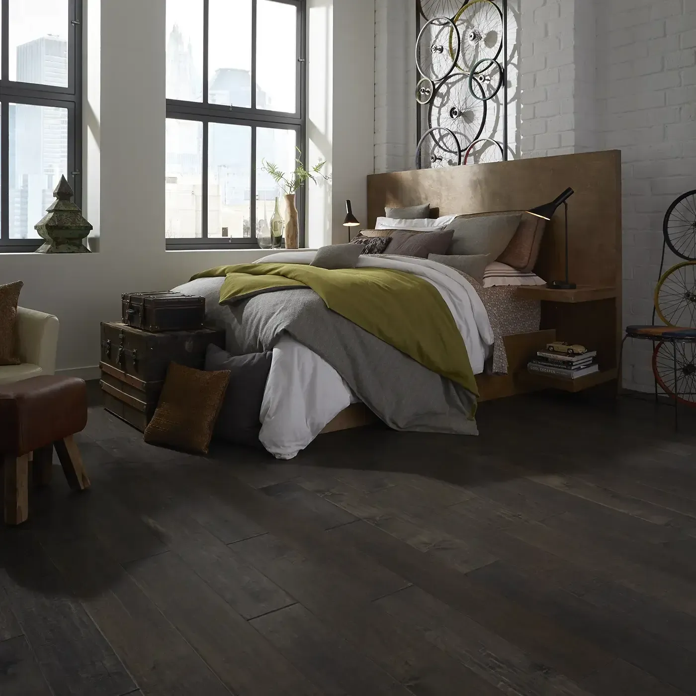 YukonMapleII-SW548-05002-Timberwolf-BedRm Dark hardwood in a modern bedroom with a large bed | The Carpet Factory Super Store